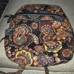 A purse size backpack in browner tones
